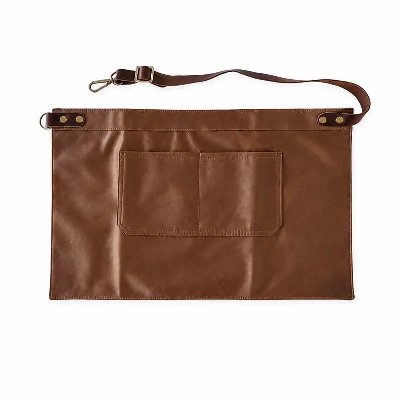 Brown waist apron with a belt and front pockets.