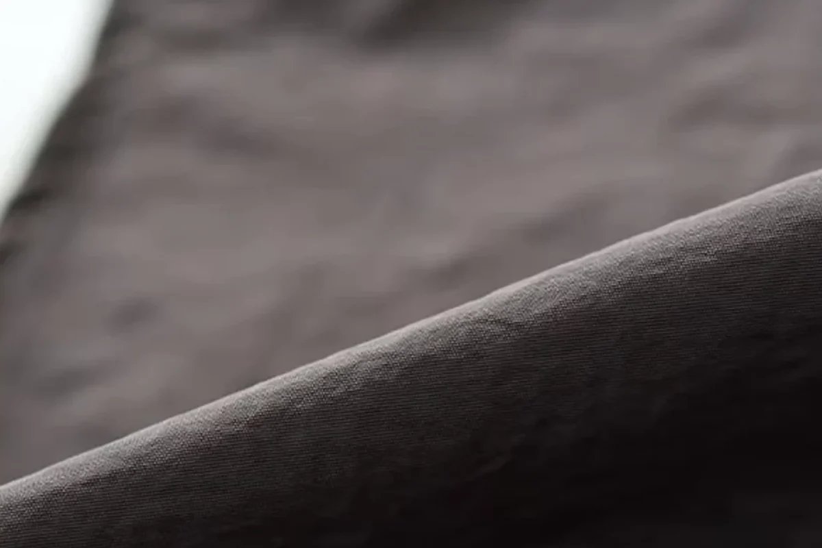 Close view of dark apron material.