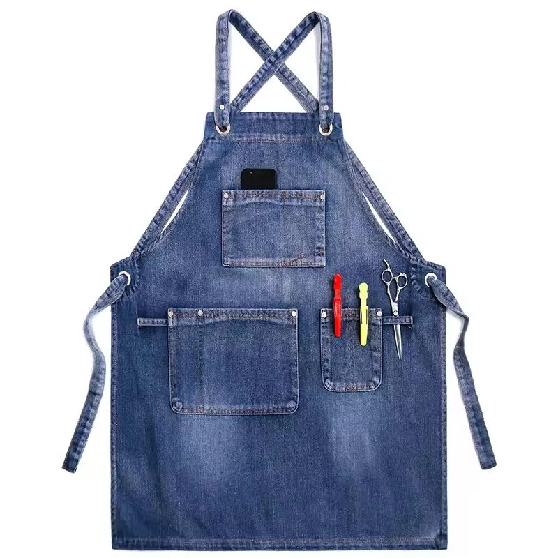 Blue denim apron with divided front pockets.