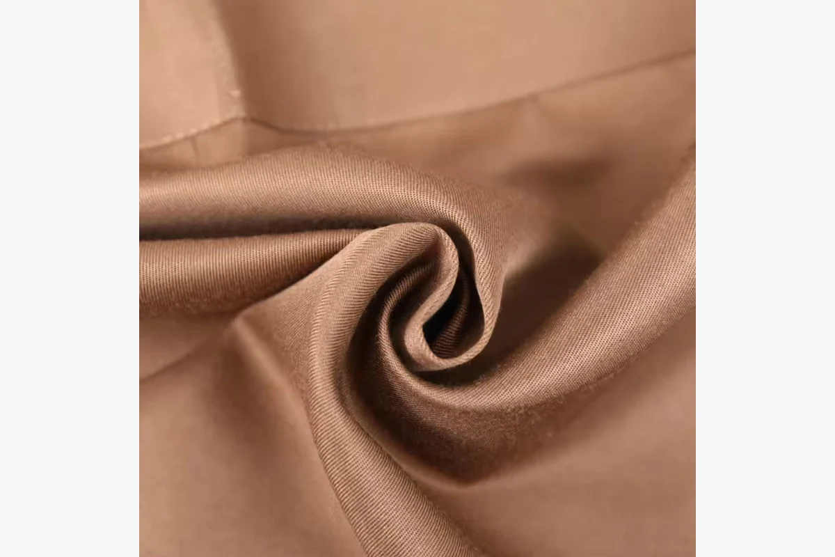 Close view of brown woven apron fabric.